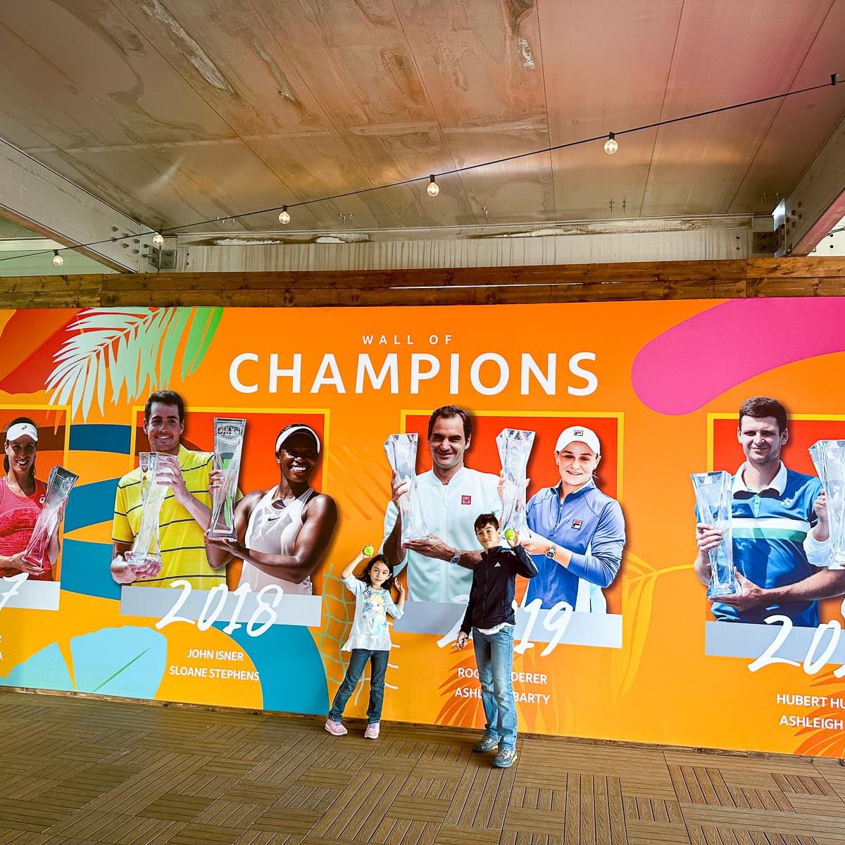 Two kids at the Wall of Champions Miami Open 2023.